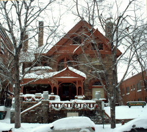 The Molly Brown house, showing it's roof covered is crisp Denver snow. Join our tour to hear the story of it's haunting!